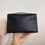  smart top-handle bag styled with outfit