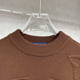 Full styled look of Louis Vuitton luxury clothing with tailored silhouette