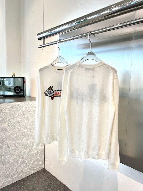 Flat lay presentation of Louis Vuitton luxury clothing with monogram-inspired silhouette