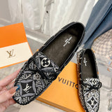 Louis Vuitton Black Classic Ballet Flats - Angled View