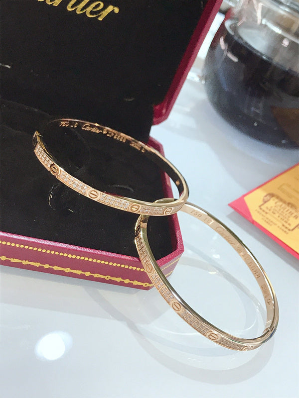 Angled view of Cartier unisex jewelry piece