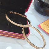 Angled view of Cartier unisex jewelry piece