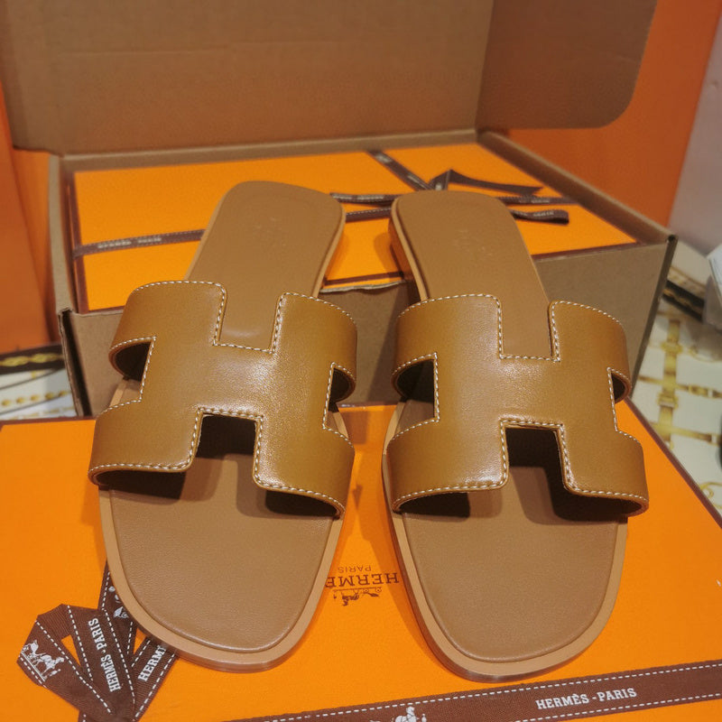 Hermès Red Crisscross Strap Sandals - Heel Detail View