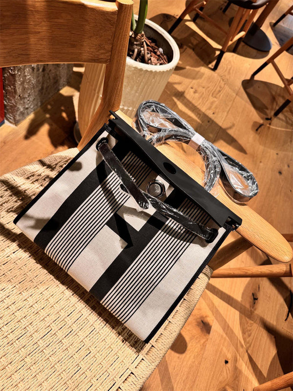 Side view of timeless structured handbag
