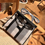 Side view of timeless structured handbag