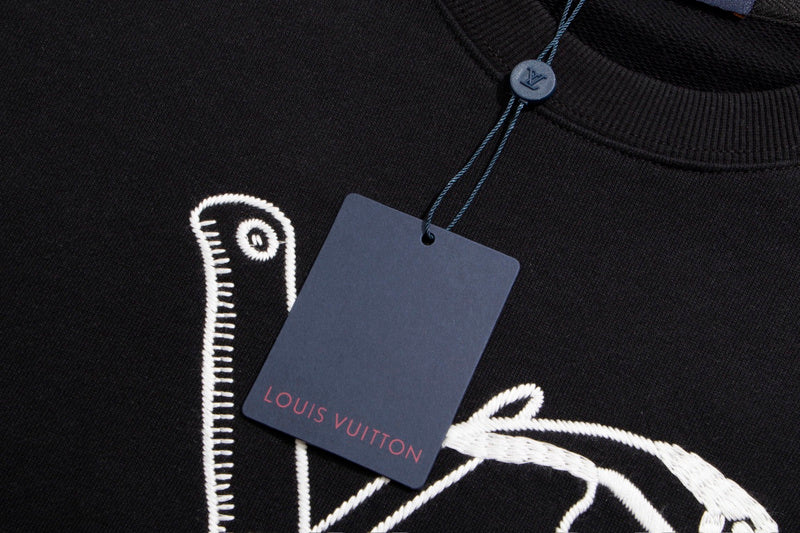 Side profile of Louis Vuitton luxury clothing with tailored silhouette