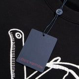 Side profile of Louis Vuitton luxury clothing with tailored silhouette