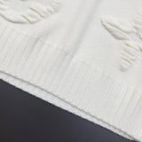 Flat lay presentation of Louis Vuitton luxury clothing with relaxed-fit cut