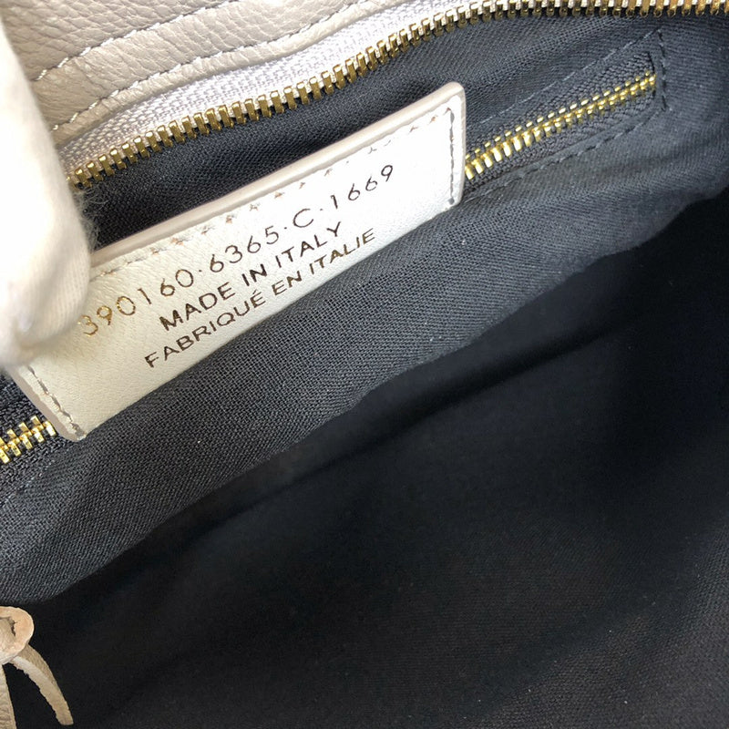 Side profile of signature premium women's handbag – women's everyday handbag