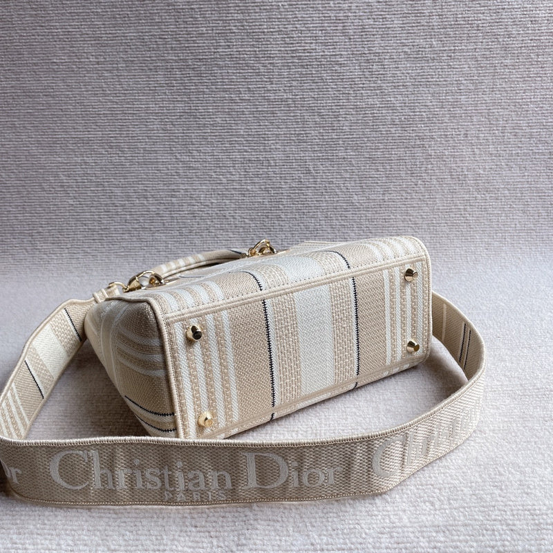 Styled lifestyle shot of polished classic women's handbag – women's luxury accessory