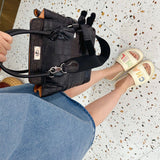  Refined handbag carried on shoulder