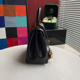 Styled lifestyle shot of modern classic women's handbag – women's designer-style accessory