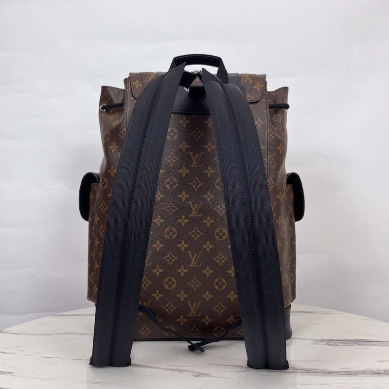 Styled lifestyle shot of structured signature women's handbag – women's luxury handbag