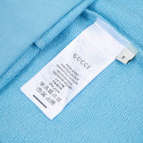 Close-up detail shot of Gucci luxury clothing with contemporary cut