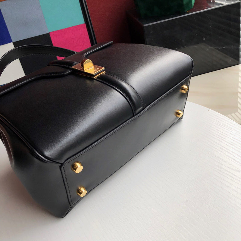 Top view of modern classic women's handbag – women's designer-style accessory