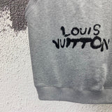 Back view of Louis Vuitton luxury clothing with logo-detail design