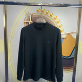 Front view of Louis Vuitton luxury clothing with monogram-inspired silhouette