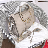 Side profile of everyday-luxe elevated women's handbag – women's luxury accessory