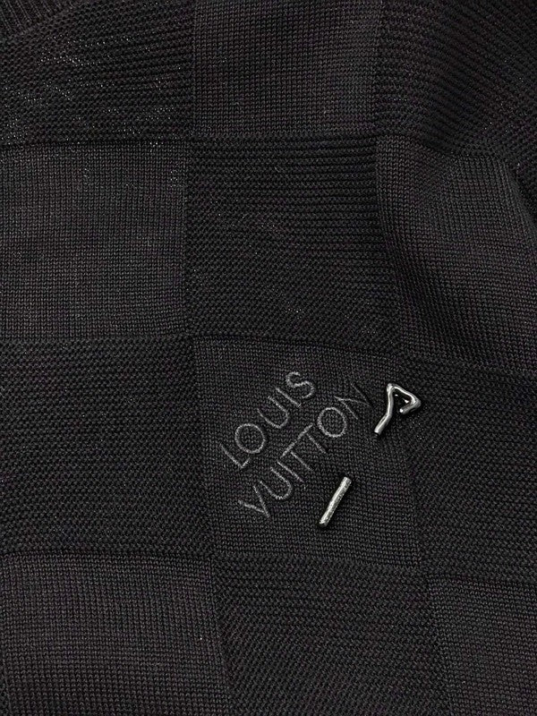 Full styled look of Louis Vuitton luxury clothing with signature branding