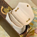 Handle and strap detail of refined elevated women's handbag – women's luxury accessory