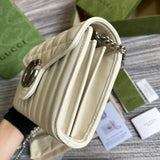 Styled lifestyle shot of sleek classic women's handbag – women's luxury accessory