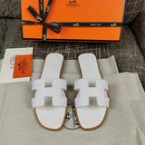 Hermes sandals Style 027 - styled lifestyle view