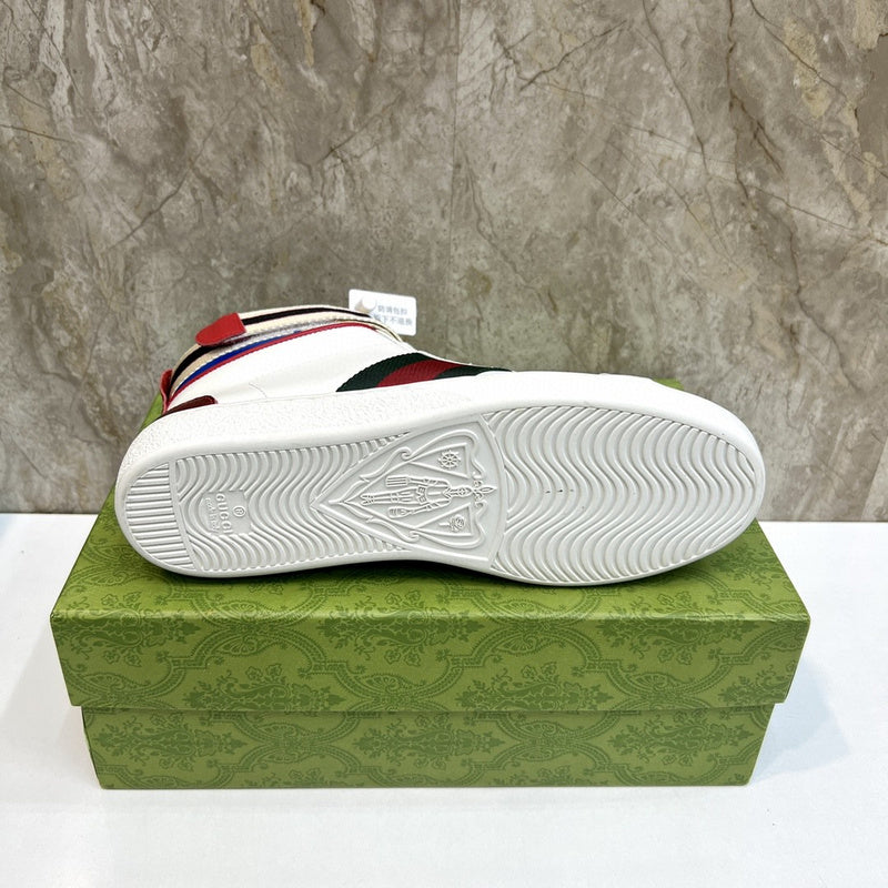 Side profile of Gucci fresh white-and-black sneakers signature lace-up style