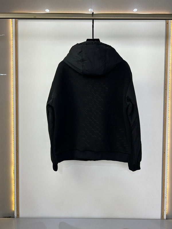 Close-up detail shot of Louis Vuitton luxury clothing with label-forward styling