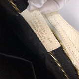 Close-up detail of polished premium women's handbag – women's statement bag