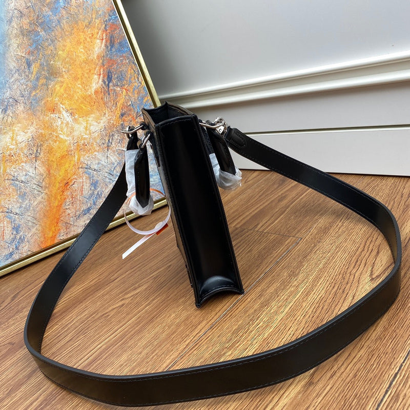 Styled lifestyle shot of refined elevated women's handbag – women's luxury accessory