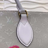 Handle and strap detail of everyday-luxe sleek women's handbag – women's designer-style accessory