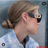 Lifestyle view of Louis Vuitton unisex sunglasses
