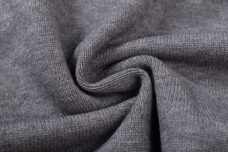 Flat lay presentation of Louis Vuitton luxury clothing with label-forward styling