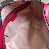 Close-up detail of modern signature women's handbag – women's luxury accessory