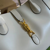 Back view of chic structured women's handbag – women's premium purse