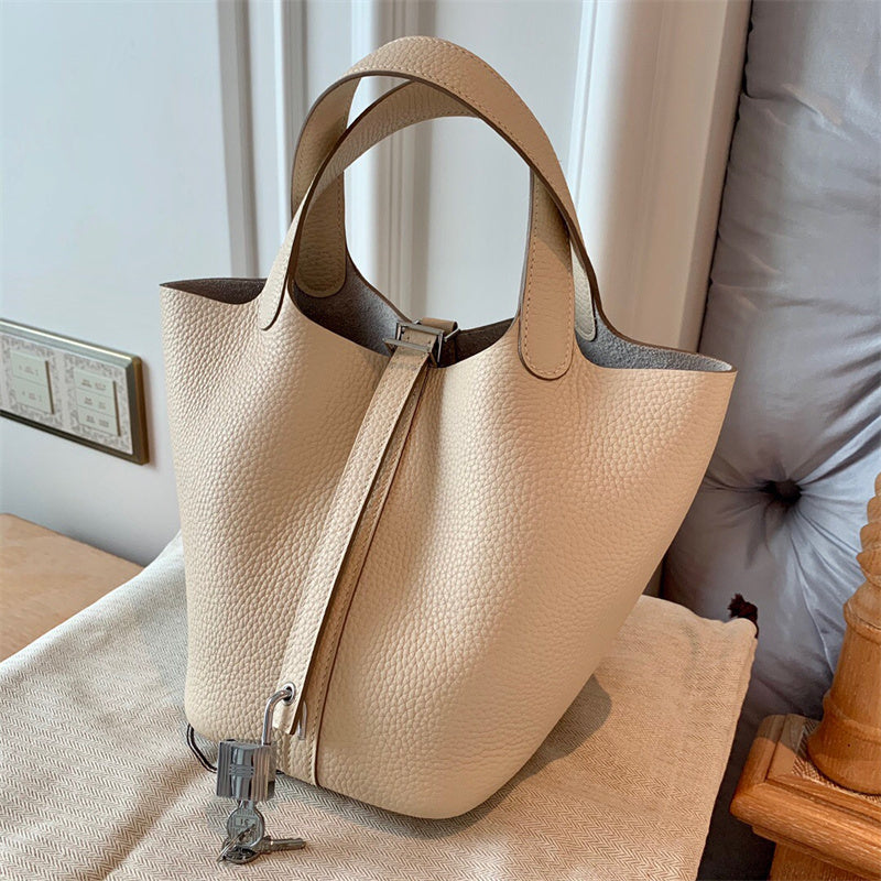  Statement carryall bag carried on shoulder 16