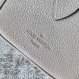 Handle and strap detail of signature polished women's handbag – women's everyday handbag
