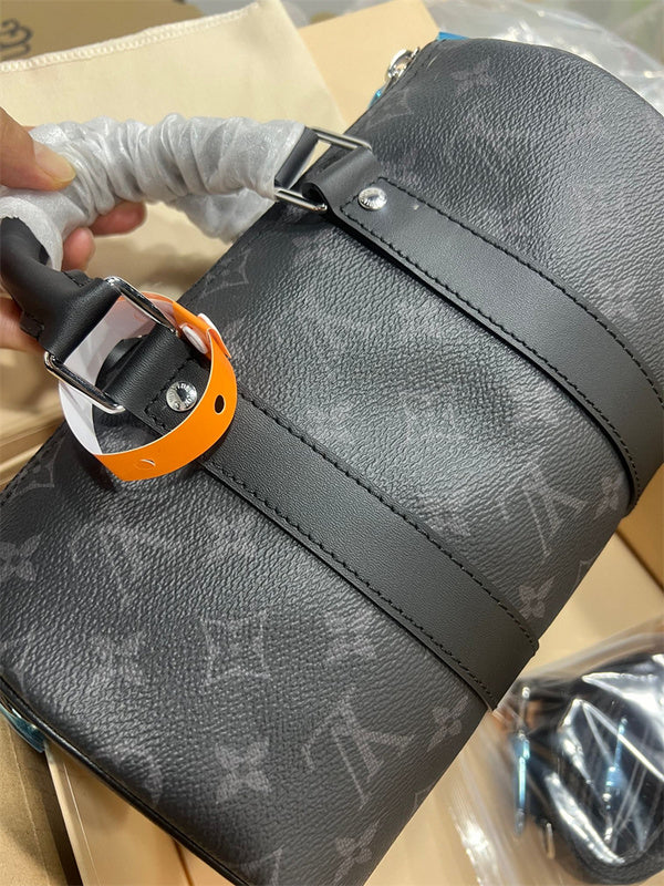  Contemporary top-handle bag carried on shoulder