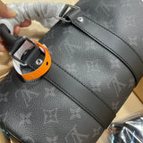  Contemporary top-handle bag carried on shoulder