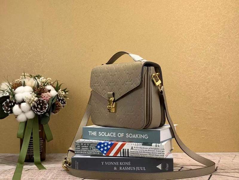 Close-up detail of classic signature women's handbag – women's luxury accessory