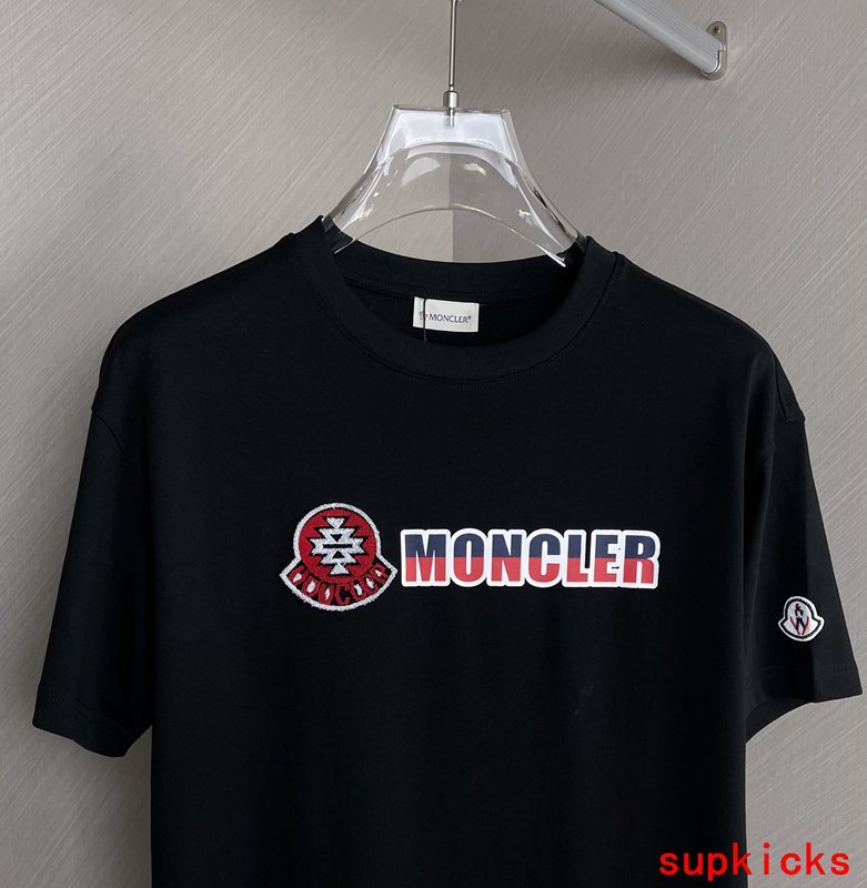 Close-up detail shot of Moncler luxury clothing with contemporary cut