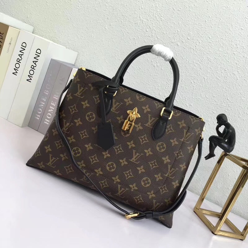 Front view of structured everyday-luxe women's handbag – women's luxury handbag