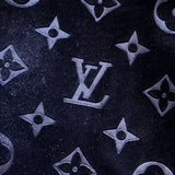 Flat lay presentation of Louis Vuitton luxury clothing with streetwear-inspired cut