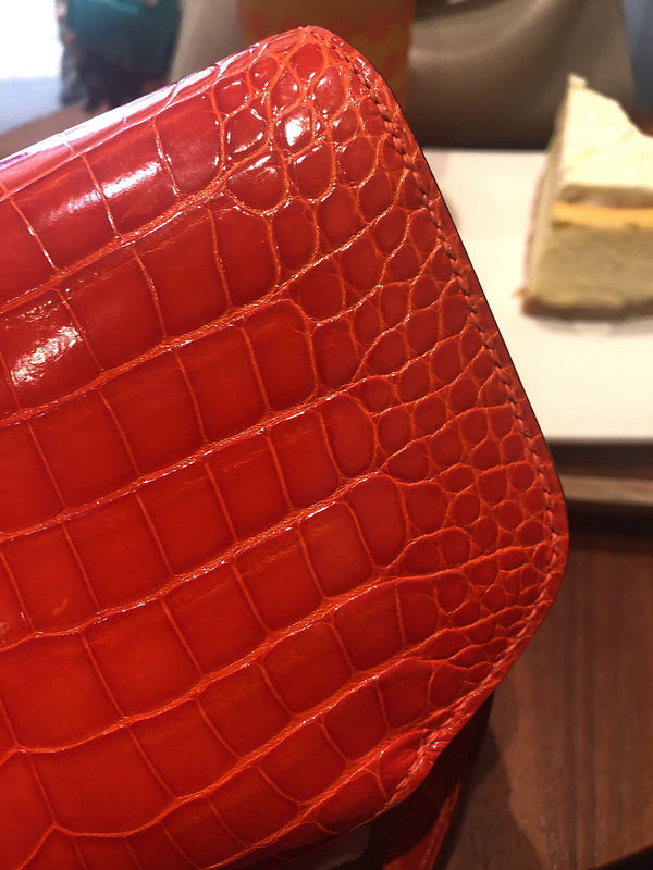 Side view of curated structured handbag
