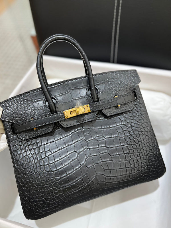 Side view of classic structured handbag