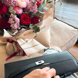  Elegant handbag carried on shoulder