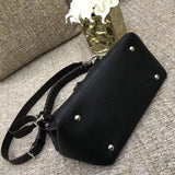 Interior view of polished sleek women's handbag – women's luxury accessory