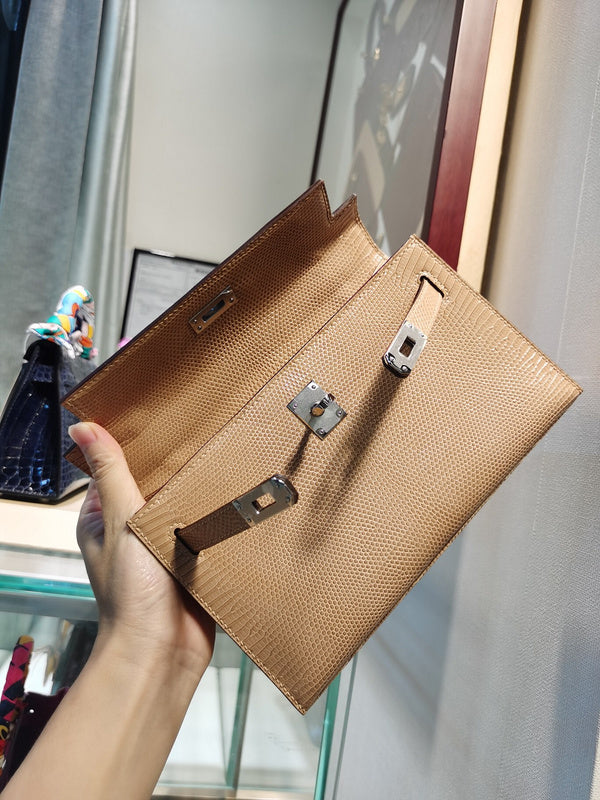 Side view of poised structured handbag
