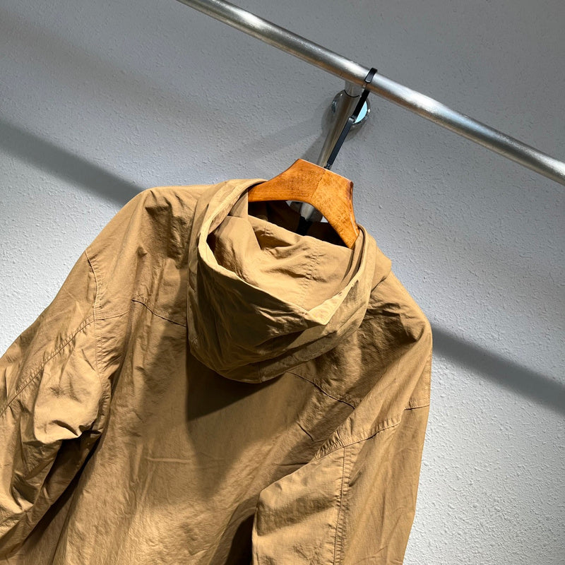 Front view of Louis Vuitton luxury clothing with label-forward styling