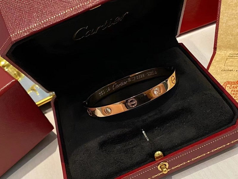 Close-up detail view of Cartier unisex jewelry piece